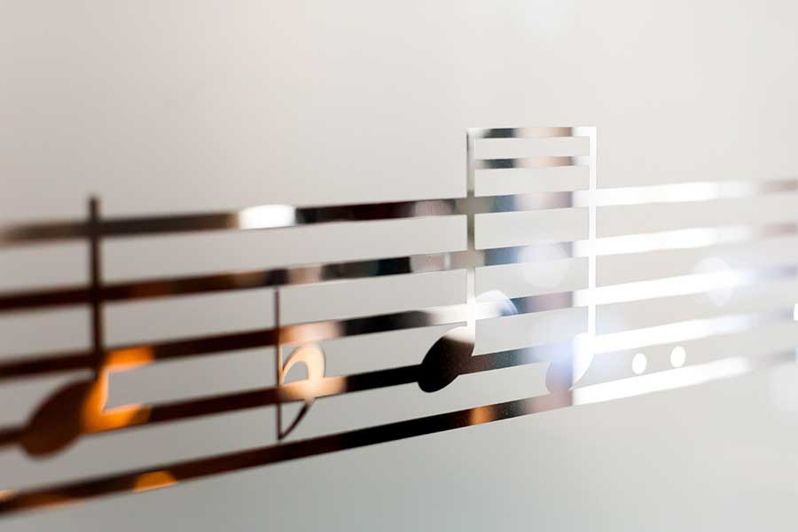 Frosted glass with musical notes design
