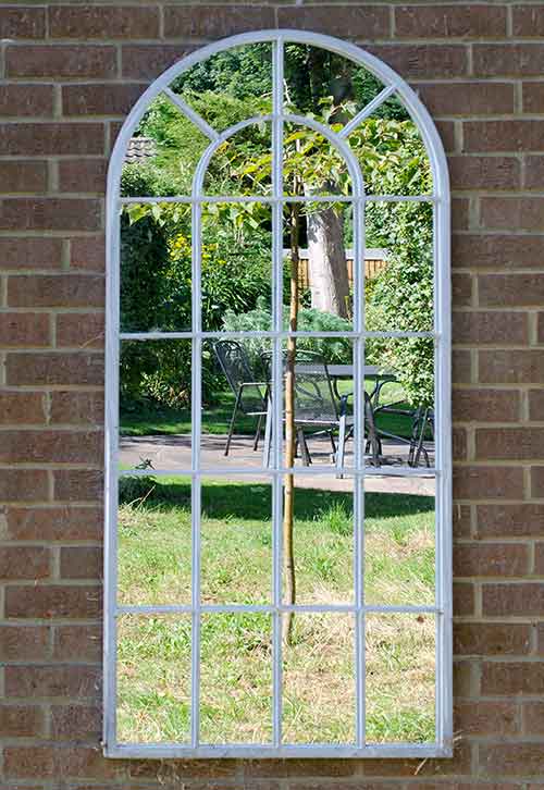 A garden wall mirror