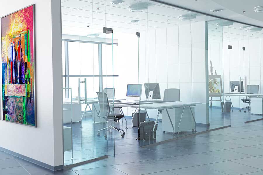 Modern office interior with stylish glass partitions