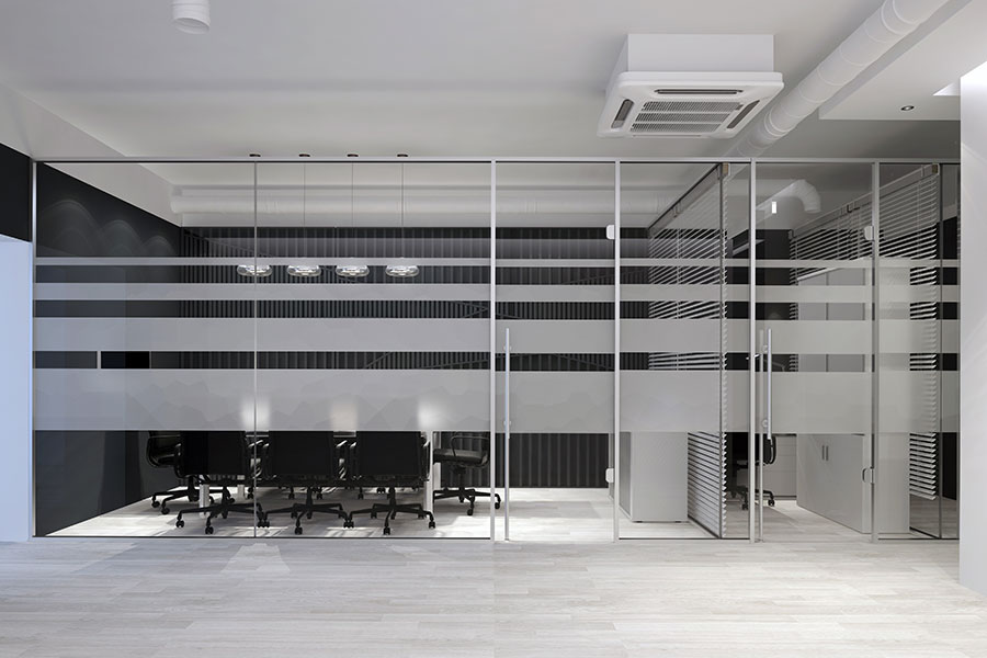 Glass office partition with frosted pattern