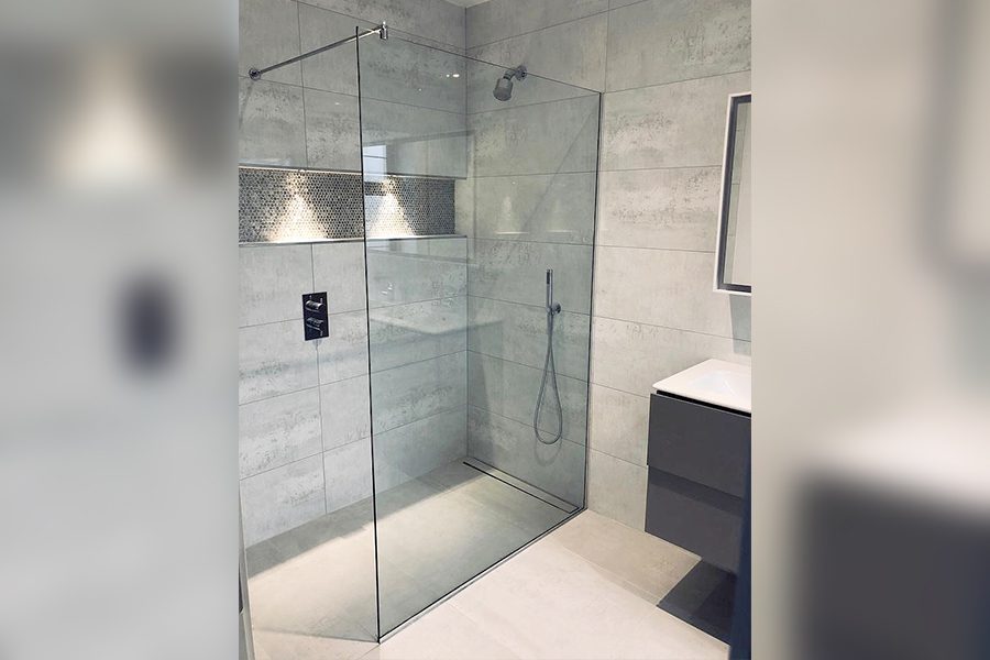 frameless corner shower enclosure with niche