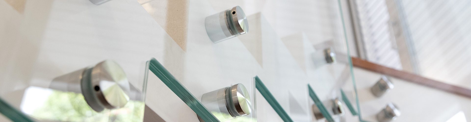 Close up of glass stair balustrade