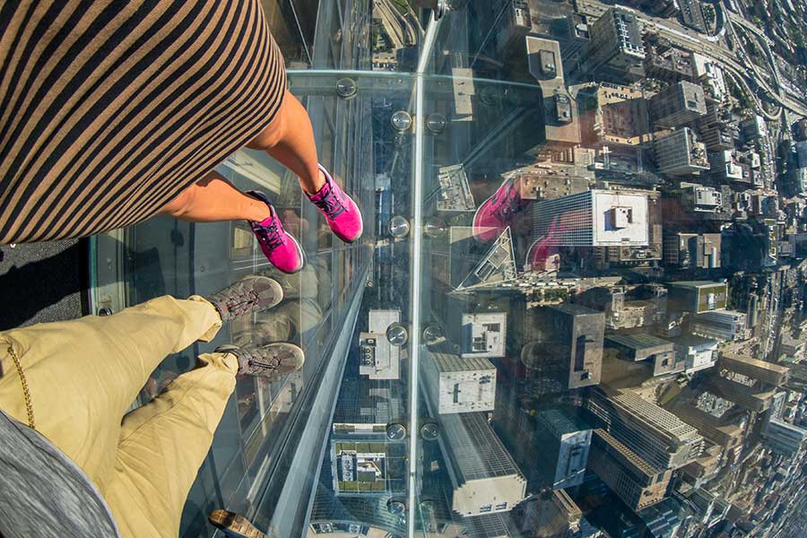 Glass floored balcony at the top of a skyscraper