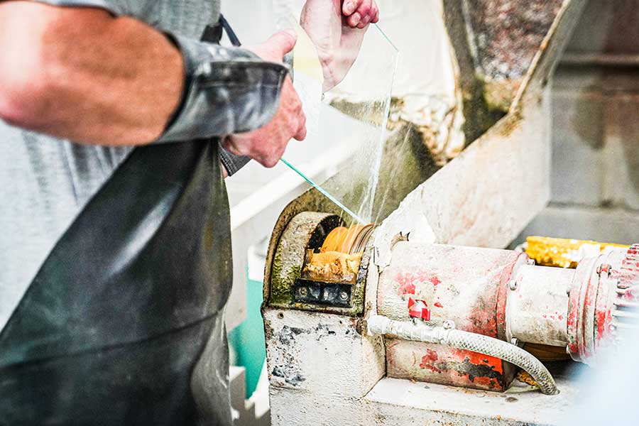 Hand polishing glass at abc Glass Processing in Portsmouth