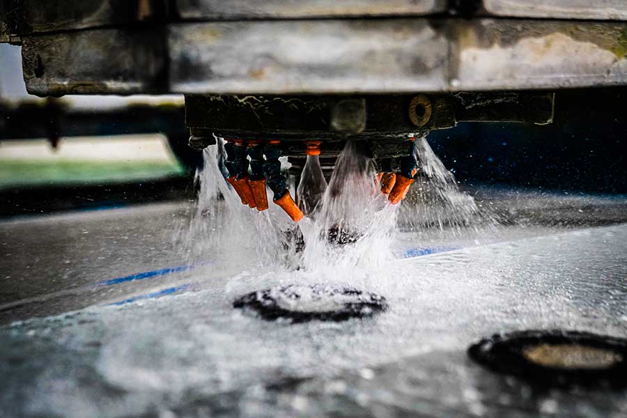 One of our cnc machines processing glass at abc in Portsmouth