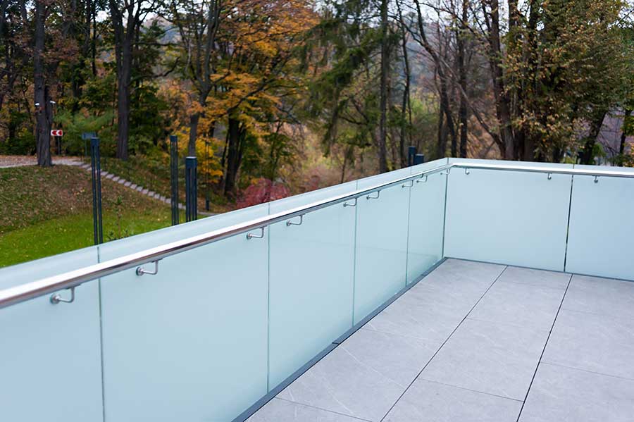 Frosted glass balustrades with handrail